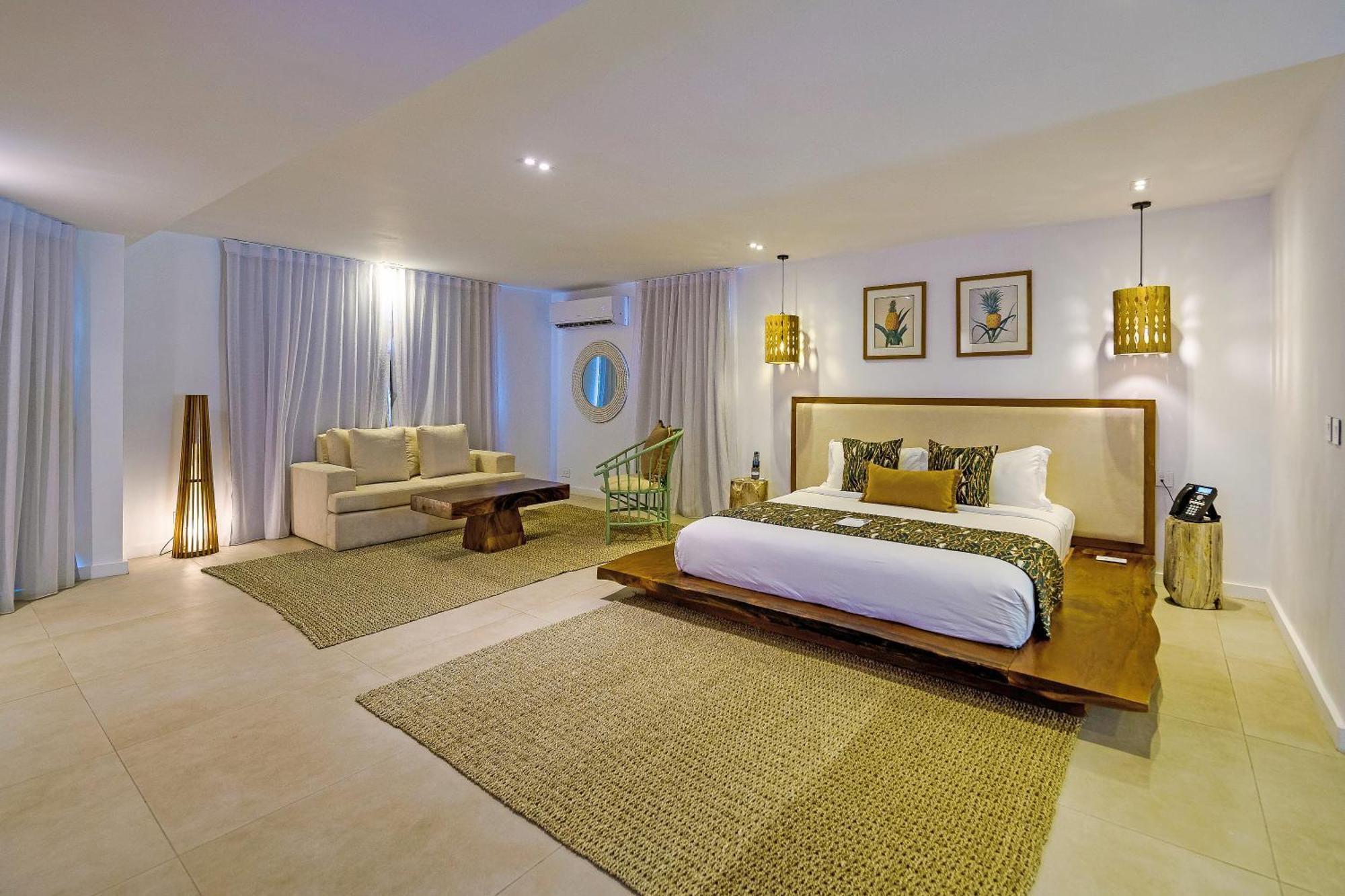 ซีเซนซ์ บูติก โฮเทล แอนด์ สปา - สำหรับผู้ใหญ่เท่านั้น Hotel เบลล์ แมร์ ภายนอก รูปภาพ A bedroom at the resort